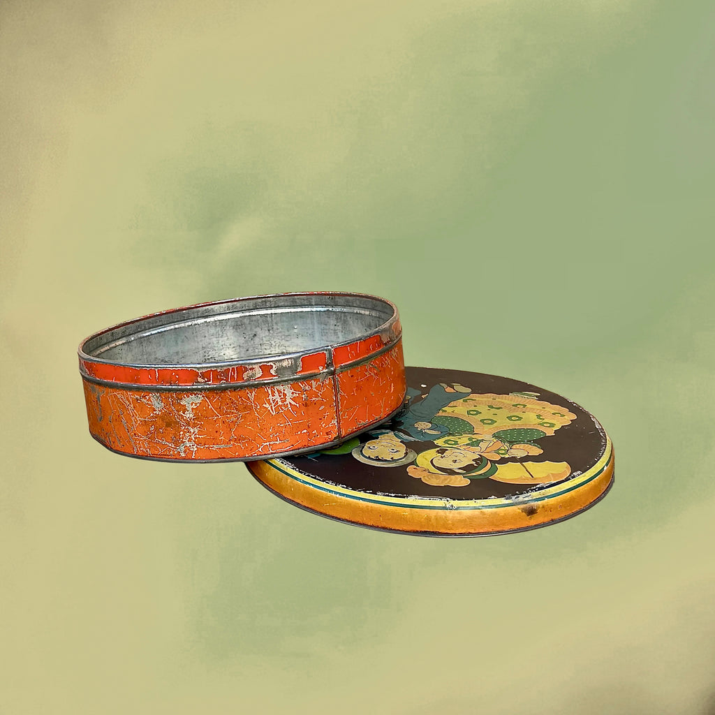Boîte Métallique Ronde Ancienne à Décor d’Enfants Illustrés – Vers 1930