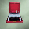 Machine à écrire OLIVETTI Studio 44 bleu – première série 1952 – design Marcello Nizzoli – valise d’origine