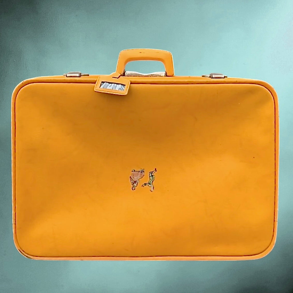 Valise vintage orange en Skaï années 60 – valise rétro avec doublure satinée