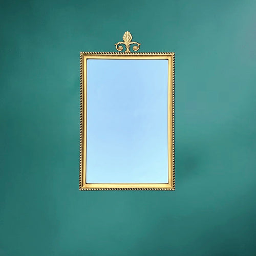 Miroir mural vintage en laiton doré à fronton feuille
