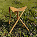 Tabouret pliant vintage bois et cuir avec sangle
