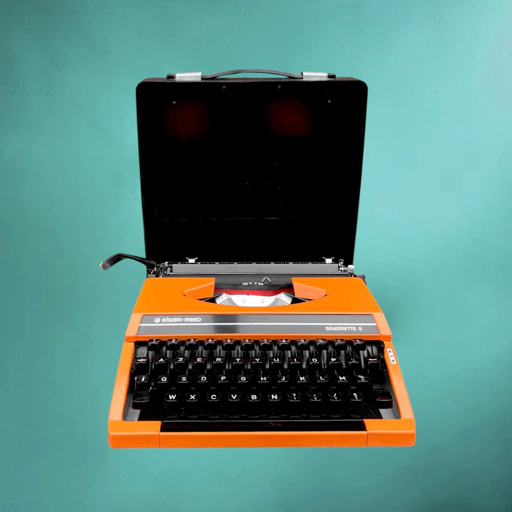 Machine a écrire vintage Silver Reed Silverette II orange-  Japon portable avec valise -  années 70 80