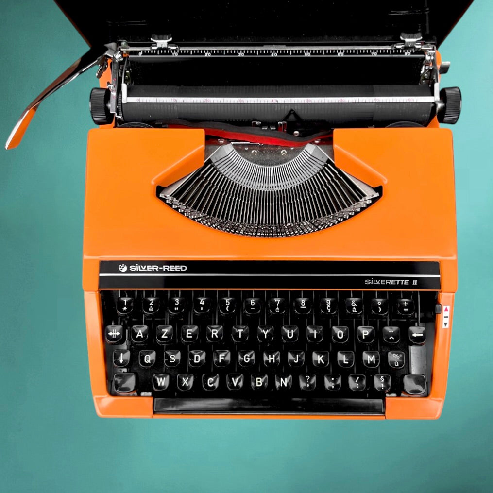 Machine a écrire vintage Silver Reed Silverette II orange-  Japon portable avec valise -  années 70 80