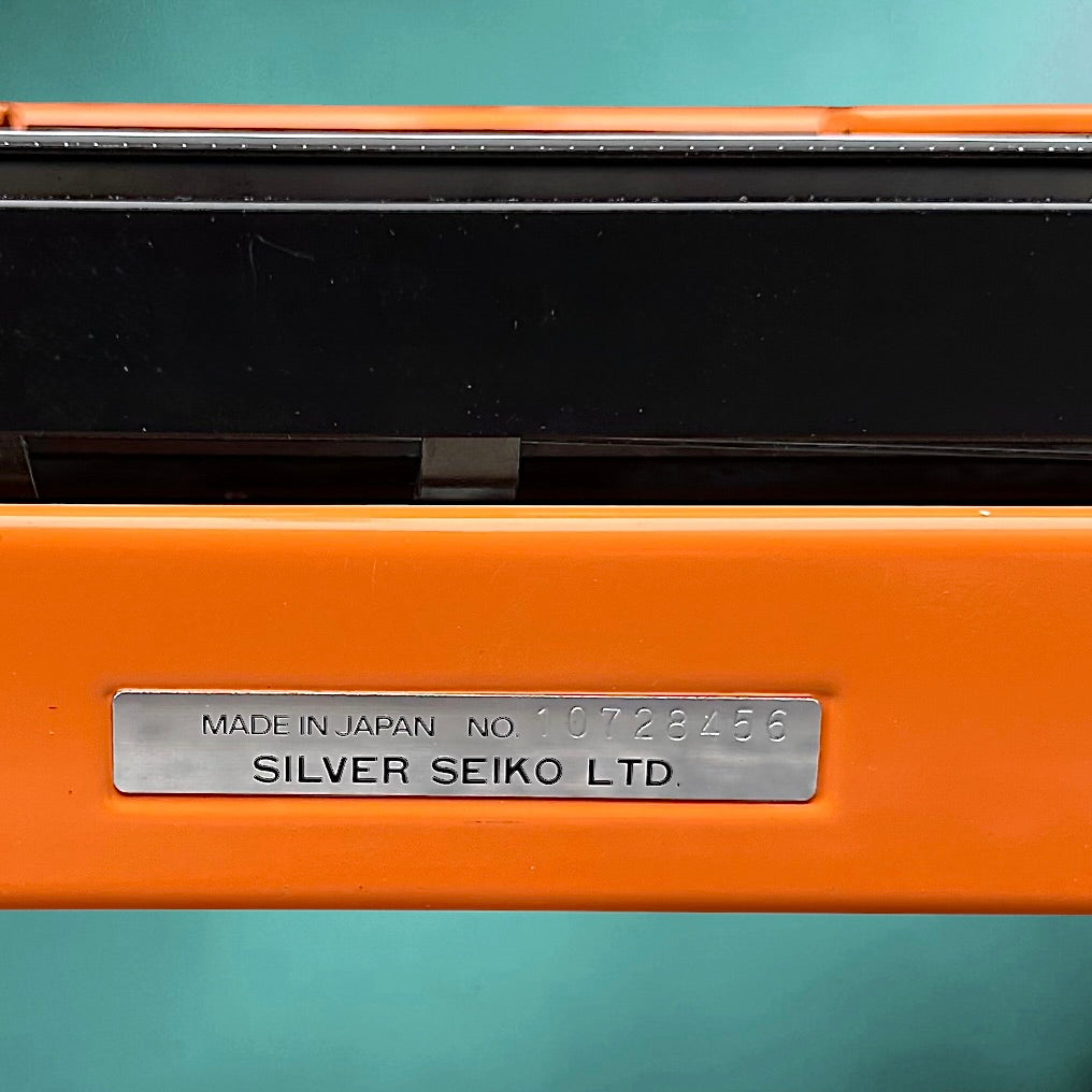Machine a écrire vintage Silver Reed Silverette II orange-  Japon portable avec valise -  années 70 80