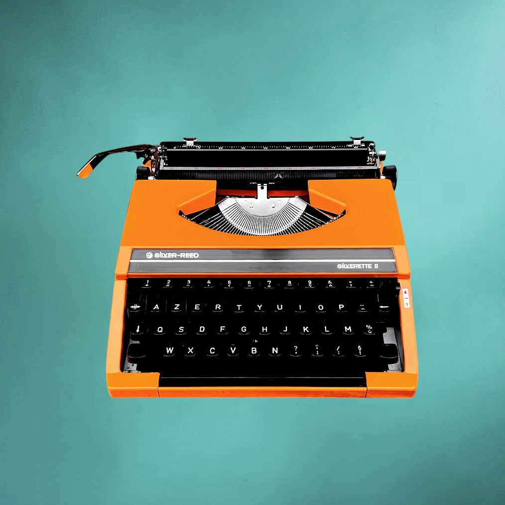 Machine a écrire vintage Silver Reed Silverette II orange-  Japon portable avec valise -  années 70 80