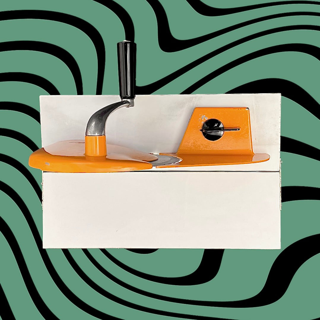 Trancheuse à pain vintage Kym orange années 70