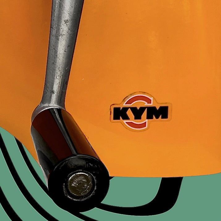 Trancheuse à pain vintage Kym orange années 70