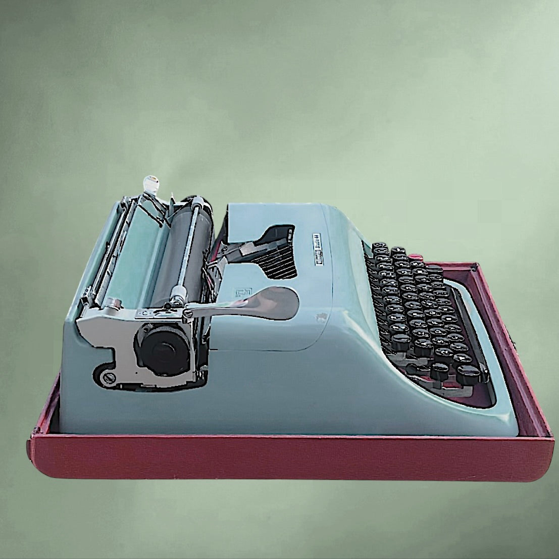 Machine à écrire OLIVETTI Studio 44 bleu – première série 1952 – design Marcello Nizzoli – valise d’origine