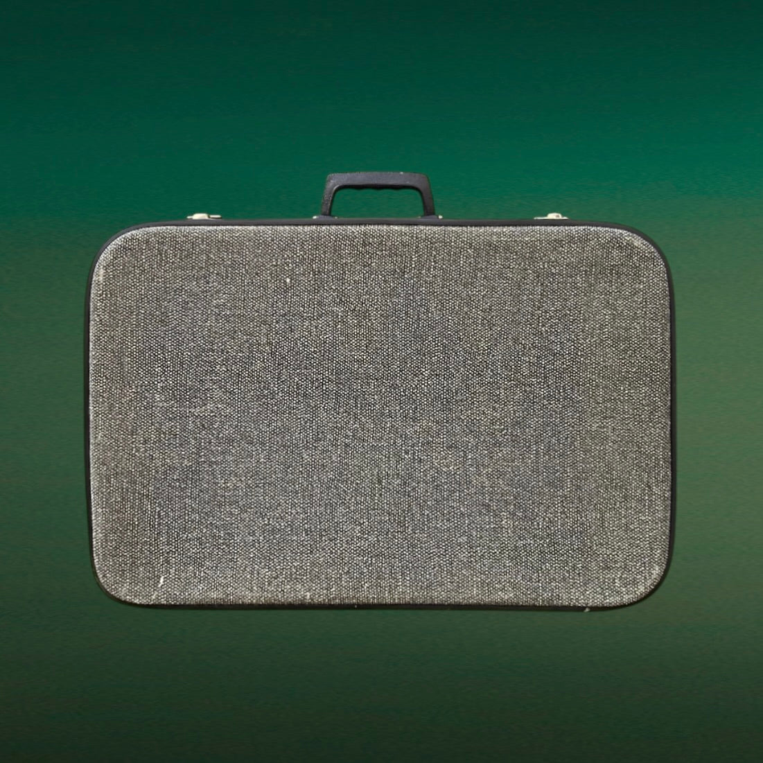 Valise vintage bleu marine moucheté blanc skaï années 60