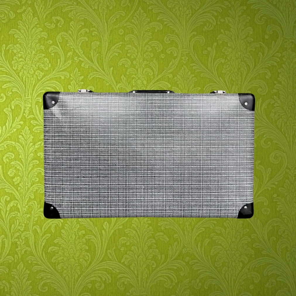 Valise ancienne en carton enduit – motif noir et blanc – intérieur à carreaux – années 60