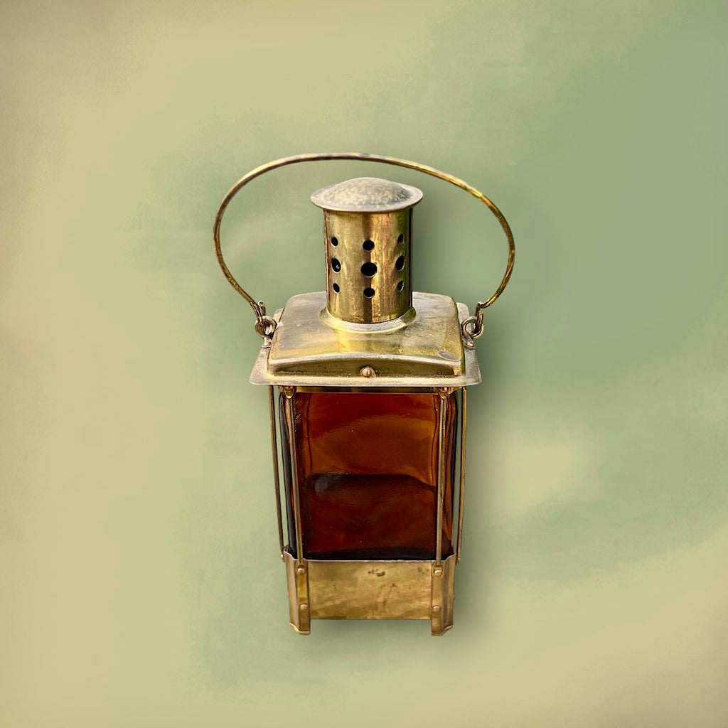 Bouteille Musicale Reuge en Verre Ambré et Laiton Mélodie “Auf Wiederseh’n, Sweetheart” – Années 50