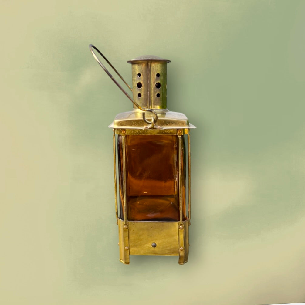 Bouteille Musicale Reuge en Verre Ambré et Laiton Mélodie “Auf Wiederseh’n, Sweetheart” – Années 50