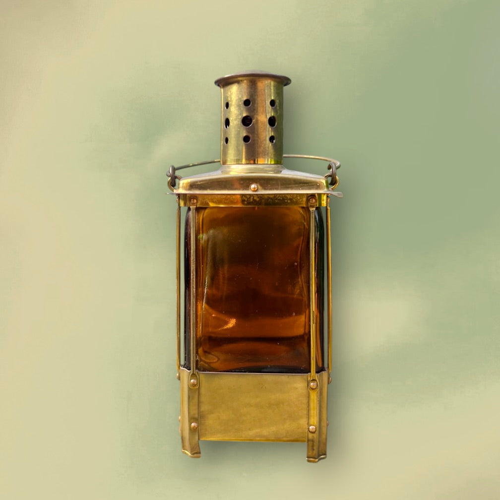 Bouteille Musicale Reuge en Verre Ambré et Laiton Mélodie “Auf Wiederseh’n, Sweetheart” – Années 50