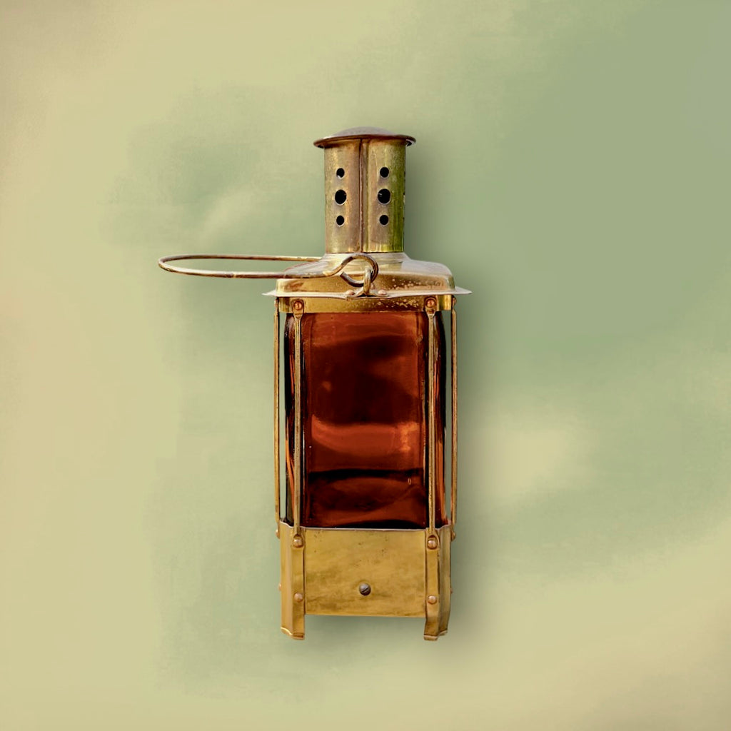 Bouteille Musicale Reuge en Verre Ambré et Laiton Mélodie “Auf Wiederseh’n, Sweetheart” – Années 50