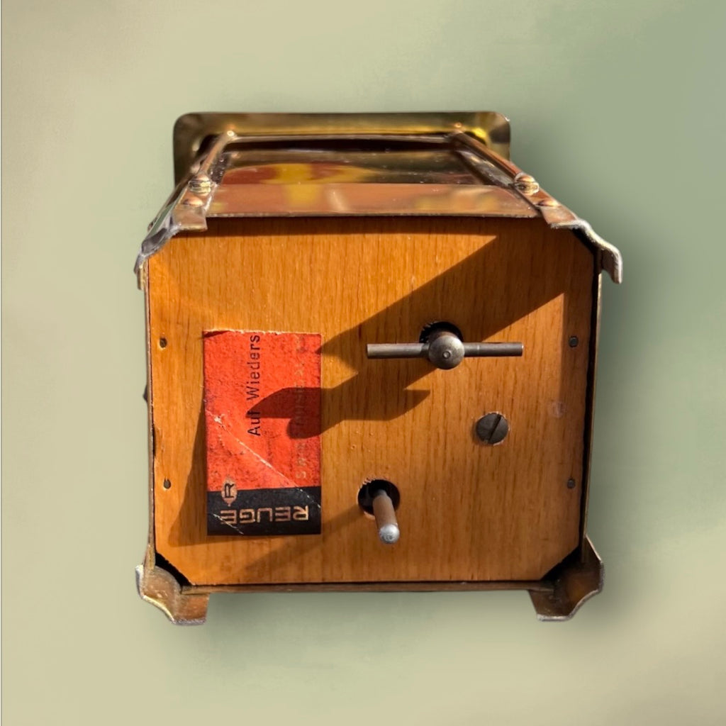 Bouteille Musicale Reuge en Verre Ambré et Laiton Mélodie “Auf Wiederseh’n, Sweetheart” – Années 50