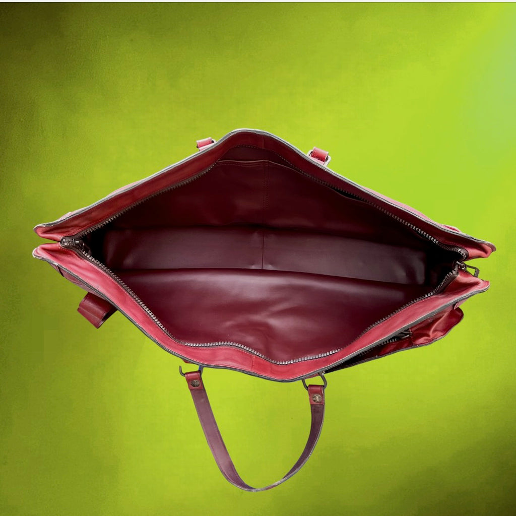 Sac de Tennis Donnay en Cuir Bordeaux avec Poche Raquette – Années 70