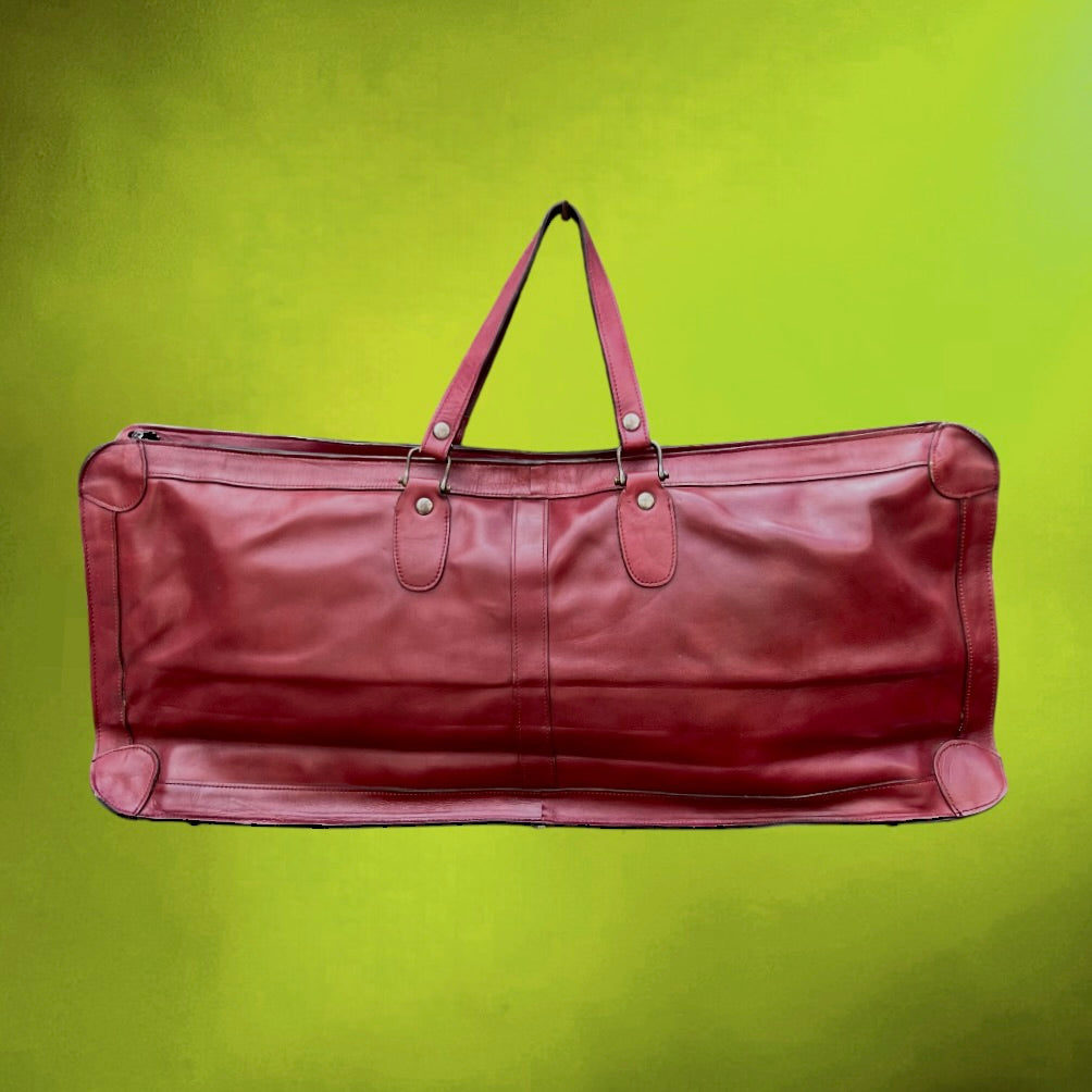 Sac de Tennis Donnay en Cuir Bordeaux avec Poche Raquette – Années 70