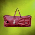 sac-tennis-donnay-cuir-bordeaux-annees70
