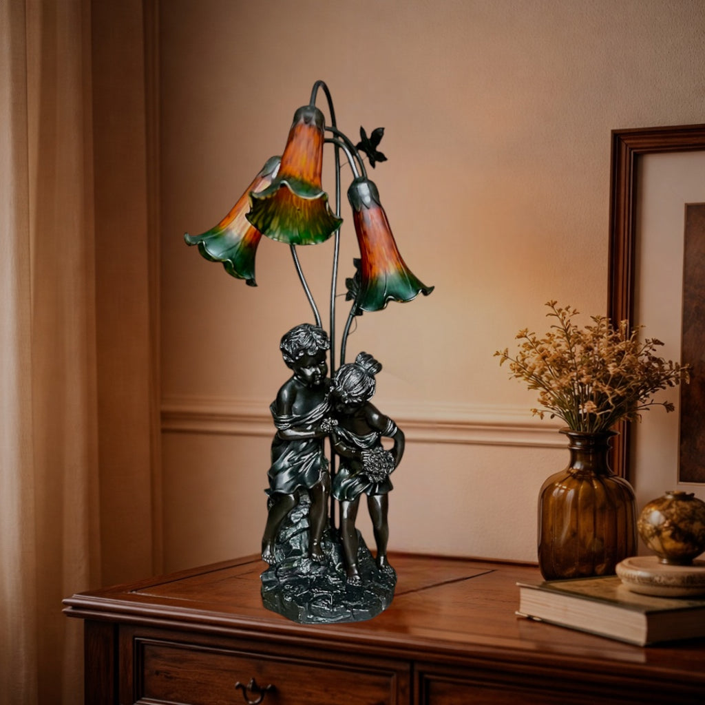 Lampe figurative néo Art nouveau – Couple d’enfants et fleurs de lys en verre moulé