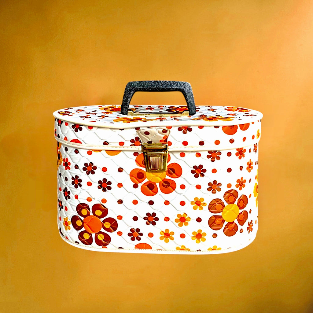 Vanity case vintage fleuri orange et marron – plastique matelassé années 70