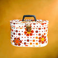 Vanity case vintage fleuri orange et marron – plastique matelassé années 70