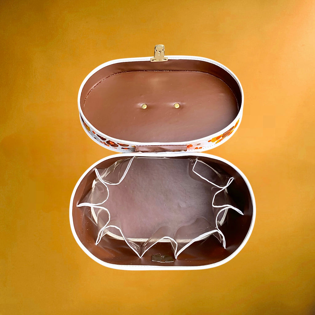 Vanity case vintage fleuri orange marron plastique matelassé trousse beauté rétro années 70
