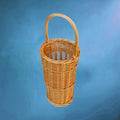 Porte-parapluie vintage en osier tressé avec anse