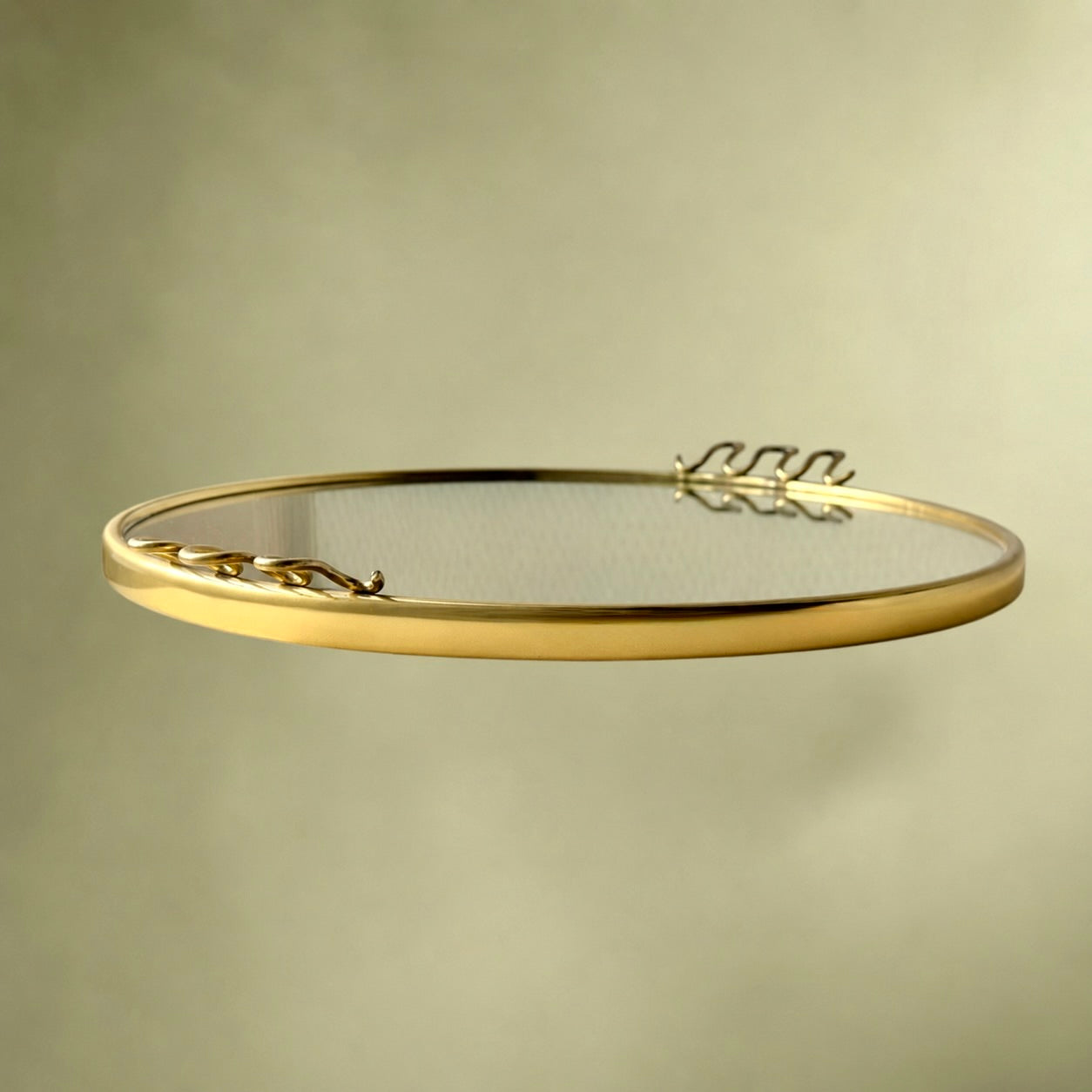 plateau-miroir-rond-metal-dore-style-josef-frank-annees50

